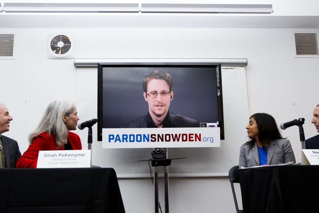 Edward Snowden is seen via satellite from Moscow, Russia, during a press conference in New York on Wednesday about a new campaign to persuade US President Barack Obama to pardon him. Photo: EPA