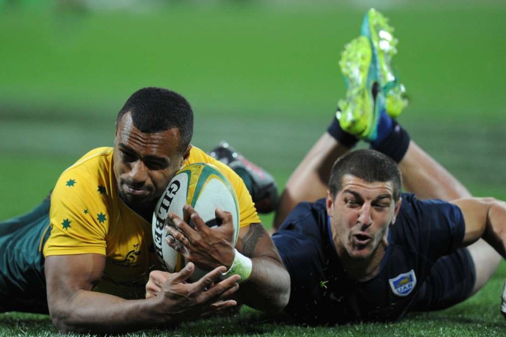 Australia scrum half Will Genia, who had an outstanding game, scores against Argentina in the Rugby Championship match in Perth. Australia won 36-20. Photo: AFP