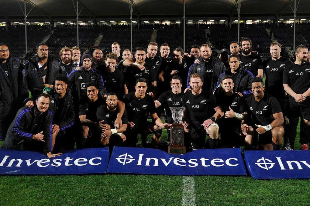 New Zealand players celebrate winning the Freedom Cup after their win over South Africa. Photo: AFP