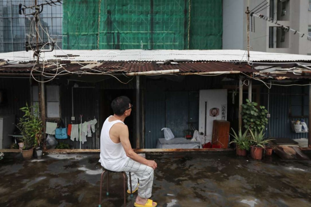 An elderly resident who is being forced out his subdivided flat in a factory in Kwun Tong. Photo: Bruce Yan