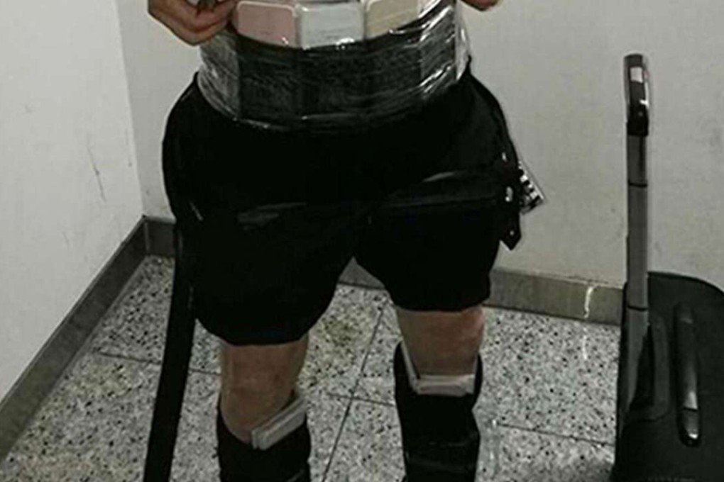 Smugglers were paid up to 300 yuan to take the latest model iPhone across the border. Photo: SCMP Pictures