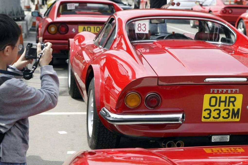 Devil-red vintage Ferraris like these ones most-definitely fall into the ‘self-indulgent want rather than basic need’ category, and as a result might well fall under the scrutiny of the tax office. Photo: AFP