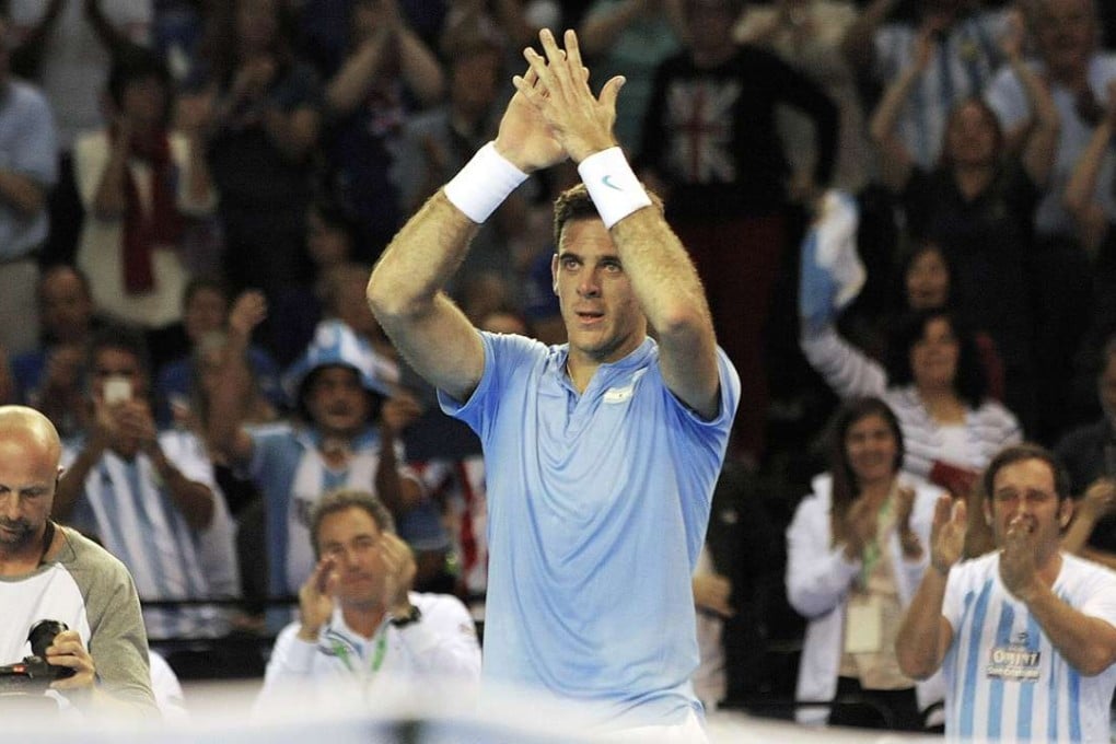 Argentina’s Juan Martin del Potro is a doubt for the crucial last rubber as Argentina edge close to eliminating the reigning champions. Photo: AFP