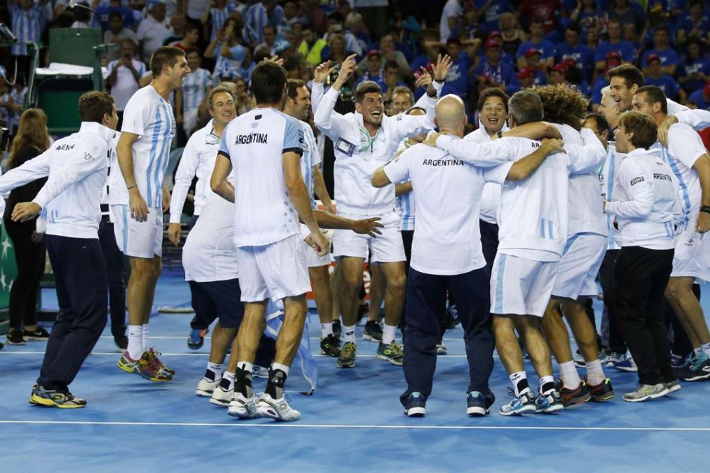 Argentina celebrate following their 3-2 semi-final win over Britain the Davis Cup. Photo: Reuters