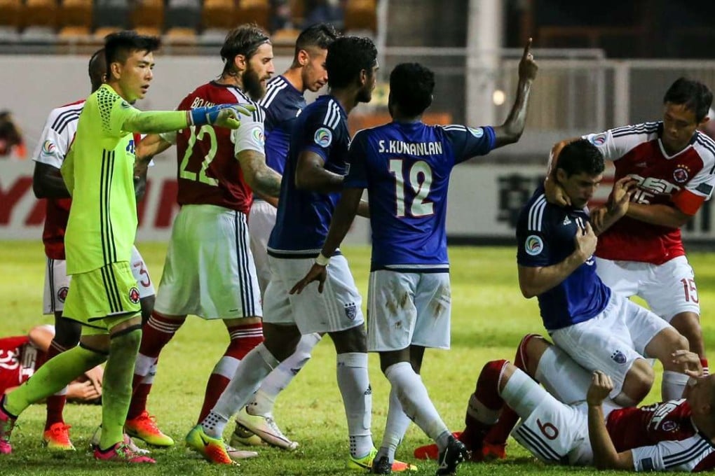Players, including South China captain Chan Wai-ho, clash during the first leg. Photos: Sam Tsang