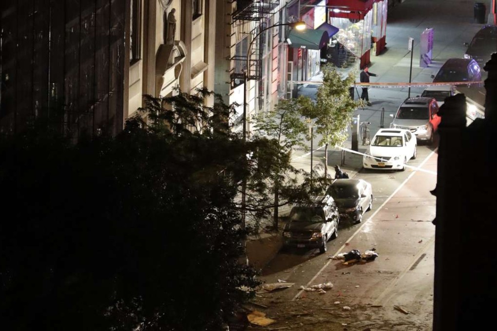 Debris is scattered in front of St. Vincent de Paul church after an explosion that injured 29 people. Photo: EPA