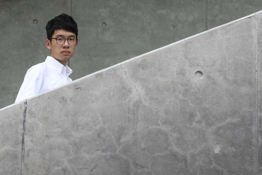 Newly elected lawmaker Nathan Law Kwun-chung, poses for a photograph in Admiralty. Photo: K. Y. Cheng