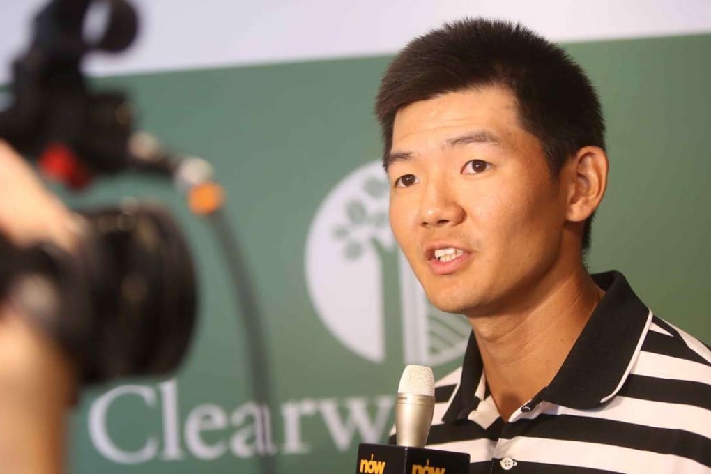 Hong Kong pro Jason Hak Shun-yat speaks to the media.