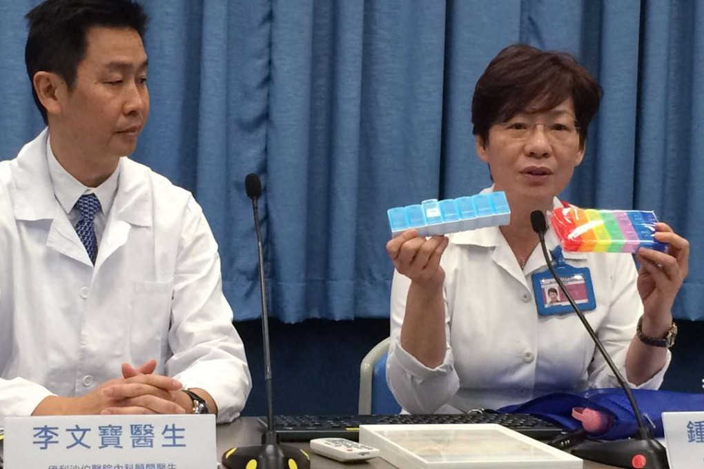 Dr Lee Man-po (left) and Rita Chung discuss the problem of HIV patients not taking medicine on time. Photo: Elizabeth Cheung