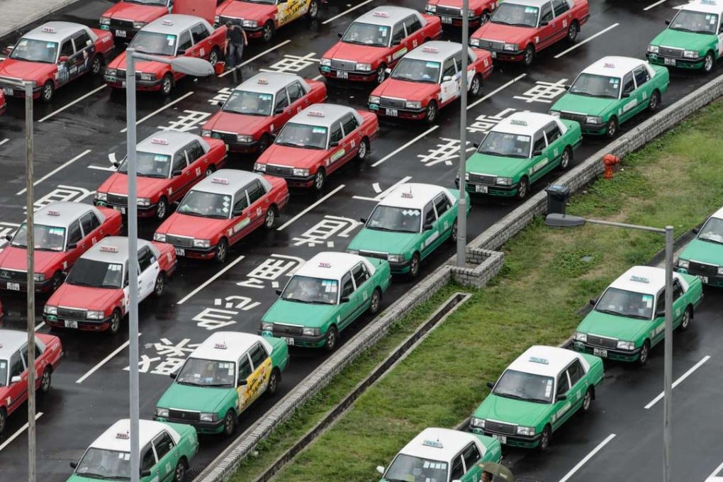 In a bid to salvage Hong Kong cabbies’ image and ward off a proposed premium taxi scheme, a taxi group is introducing CCTV-equipped taxis to improve the sector’s quality of service. Photo: AFP