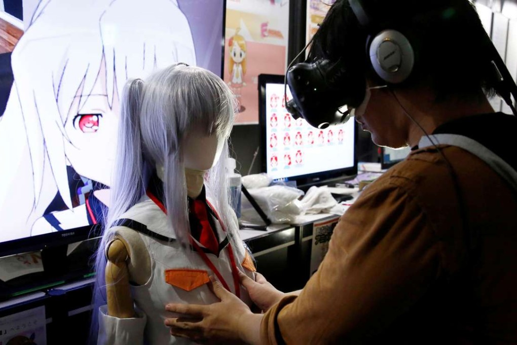 A man tries M2’s E-mote system. Photo: Reuters