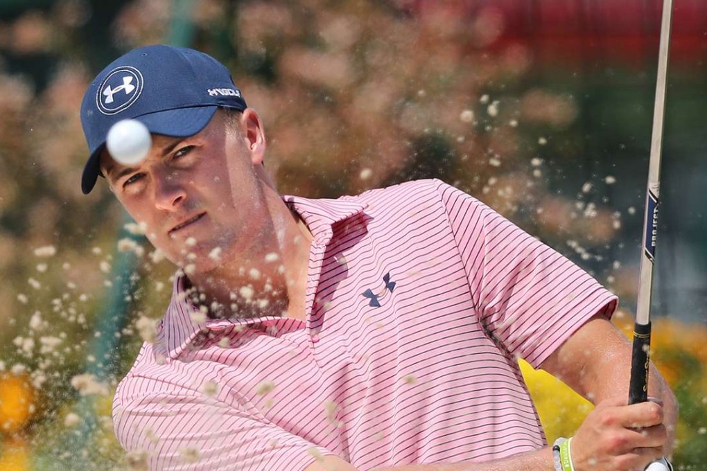 Jordan Spieth hits sand shots to the practice green while preparing to defend his Tour Championship title at East Lake Golf Club in Atlanta on Tuesday. Photo: AP
