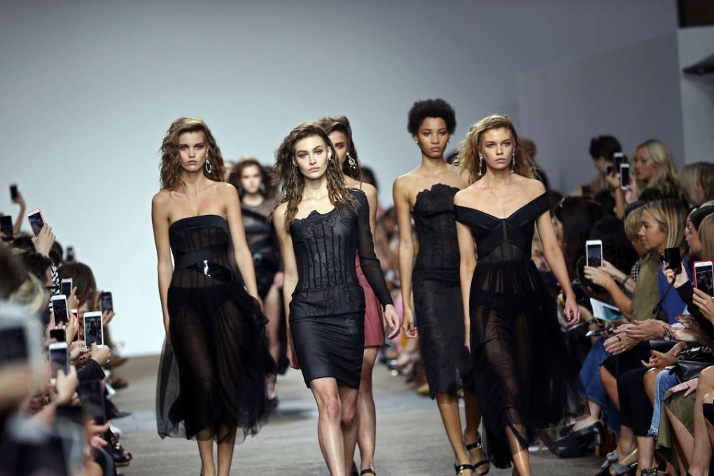Models present creations at the Topshop Unique catwalk show during London Fashion Week. Photo: Reuters