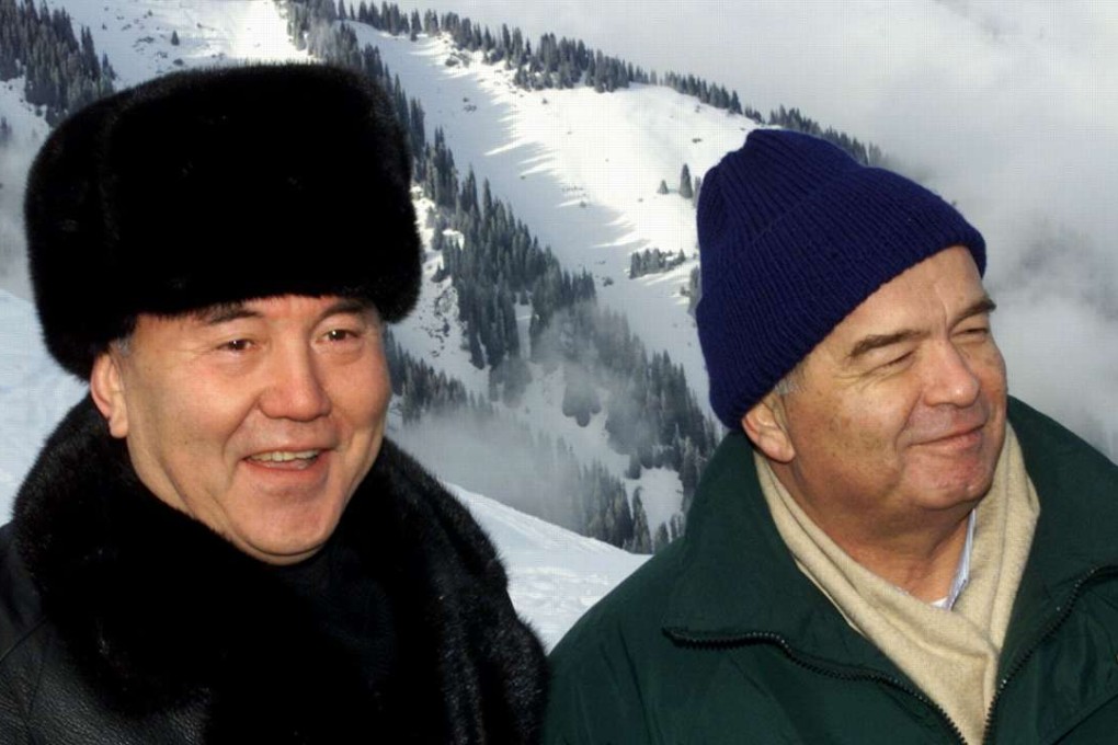 Kazakh President Nursultan Nazarbayev (left) sings a song as his late Uzbek counterpart Islam Karimov listens as they stay at the ski resort Chimbulak outside Almaty, Kazakhstan,in 2001. Photo: Reuters
