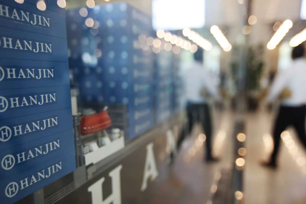 A model of container ship with Hanjin Shipping Co.'s logos is displayed at its head office in Seoul, South Korea, Photo: Yonhap via AP