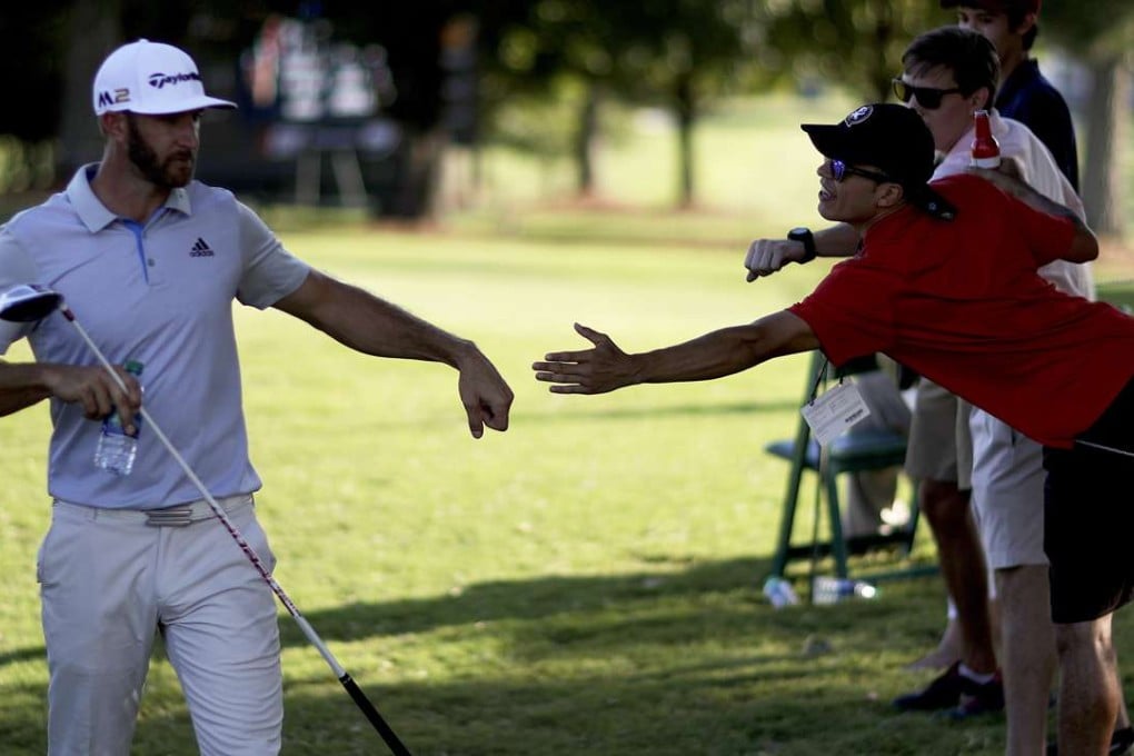 Dustin Johnson is in a share of the lead after round one. Photo: AP