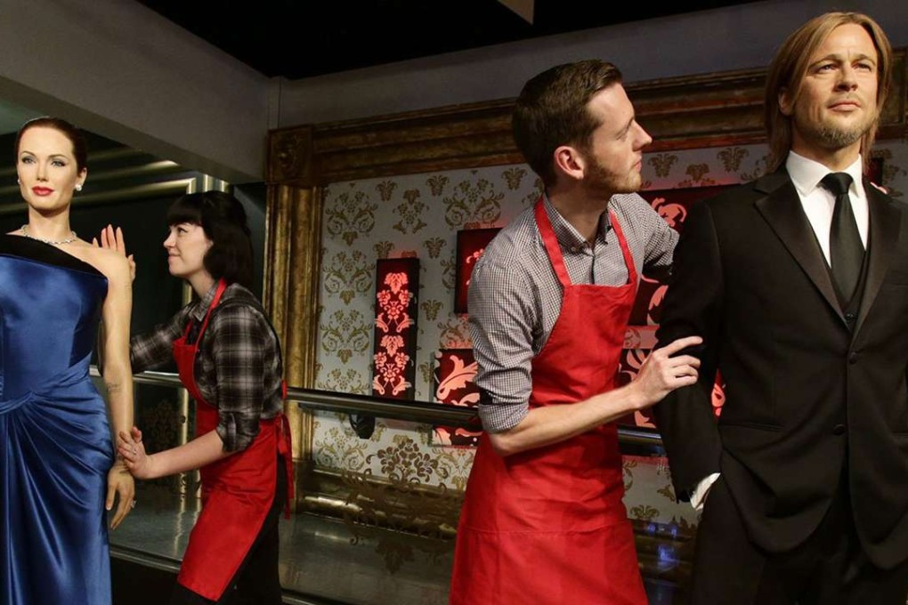 Staff at Madame Tussauds separate wax figures of Angelina Jolie and Brad Pitt's wax to reflect the reality of the celebrity couple’s divorce. Photo: Twitter/MadameTussauds