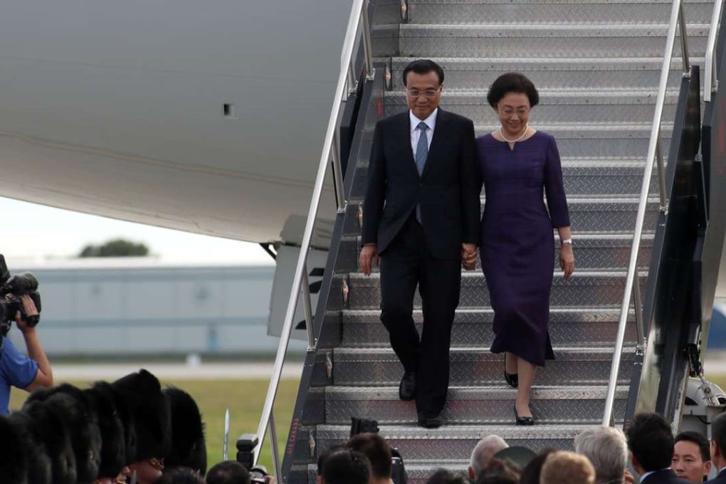 Chinese Premier Li Keqiang and his wife Cheng Hong arrive in Ottawa, Canada on Wednesday. Photo: AFP