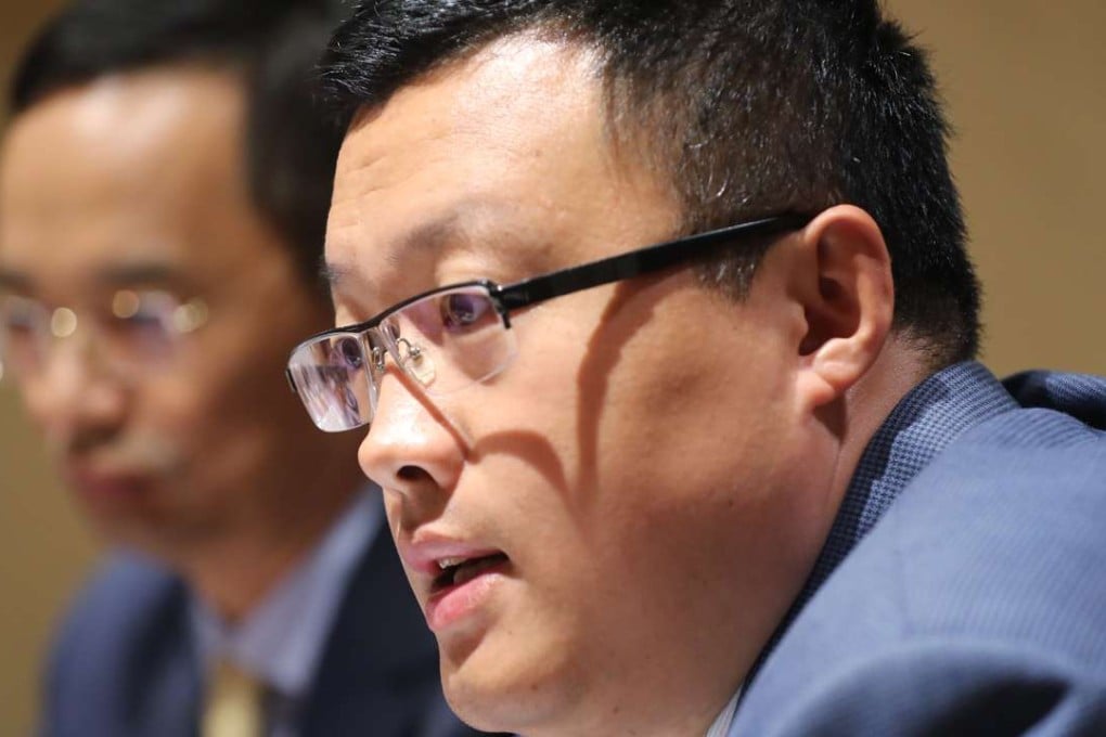 Broad Greenstate chairman and CEO Wu Zhengping (left) and Greenland Group Secretary of the Board Wang Xiaodong attend a press conference at Conrad Hotel in Admiralty on Friday. Photo: Edward Wong