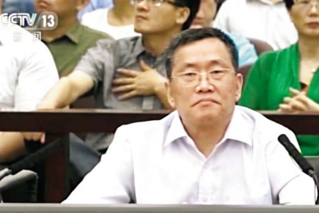 Lawyer Zhou Shifeng faces subversion charges in a court in Tianjin in August. Photo: CCTV