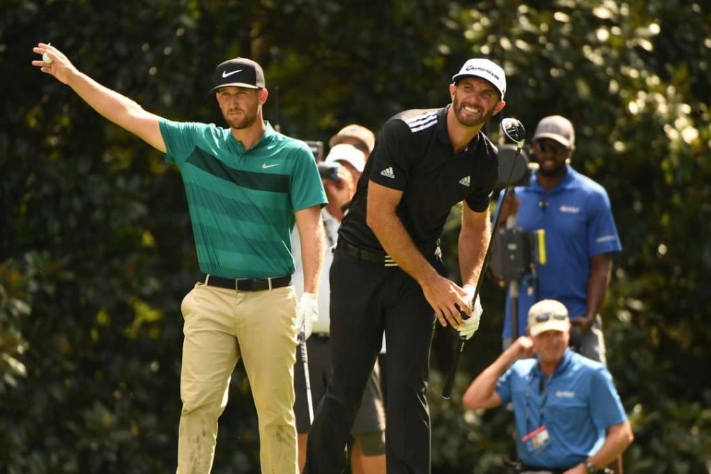 Dustin Johnson (R) tees off and Kevin Chappell reacts on the seventeenth tee during the third round of the Tour Championship at East Lake Golf Club. Photo: USA Today
