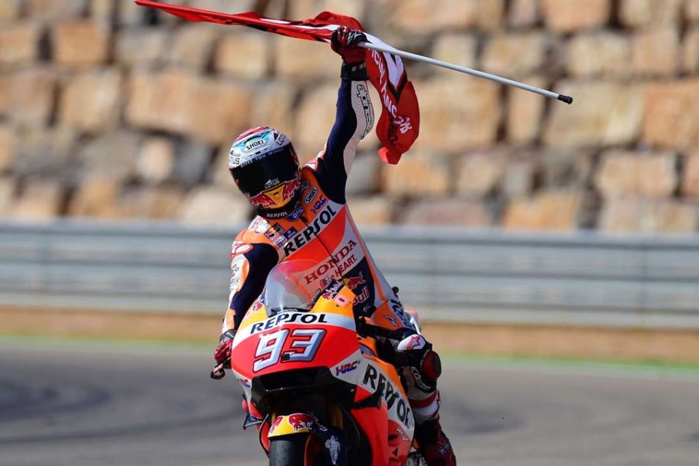 Repsol Honda Team's Spanish rider Marc Marquez celebrates after winning the Aragon Grand Prix at the Motorland racetrack in Alcaniz. Photo: AFP