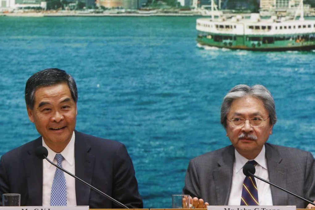 Chief Executive Leung Chun-ying (left) and Financial Secretary John Tsang Chun-wah at a press conference on the controversial housing project in Wang Chau last week. Photo: Sam Tsang