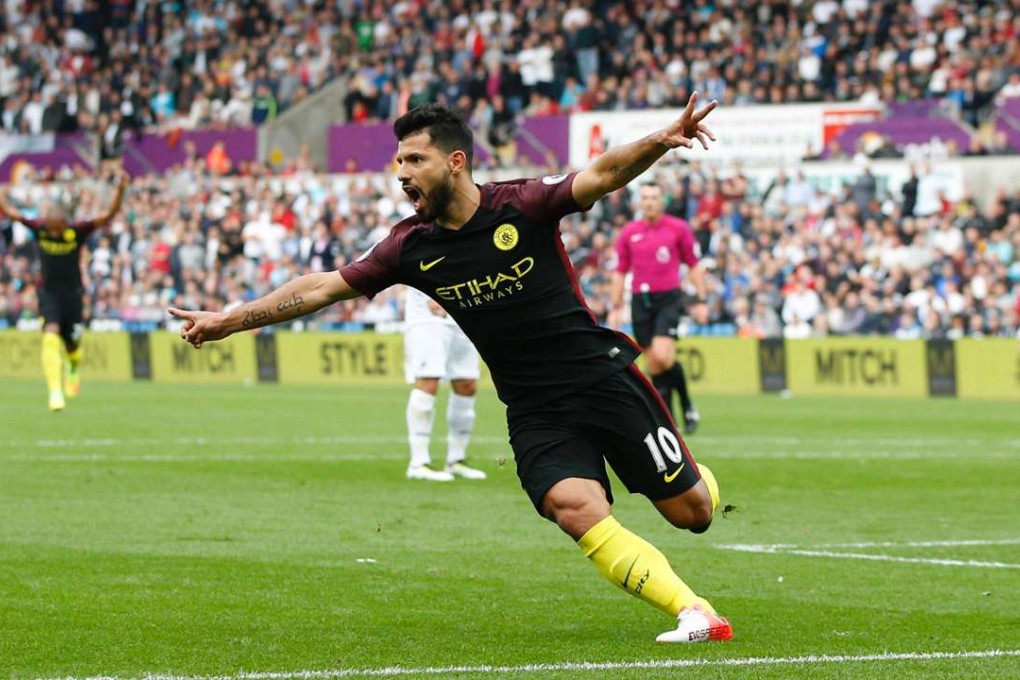 Manchester City striker Sergio Aguero celebrates scoring the opening goal. Photo: AFP