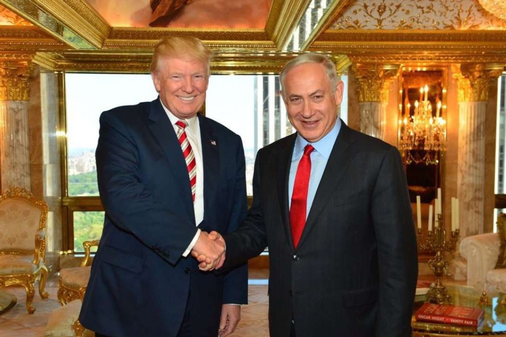 US Republican presidential candidate Donald Trump greets Israeli Prime Minister Benjamin Netanyahu at Trump’s home in Trump Tower in New York on Sunday. Photo: EPA