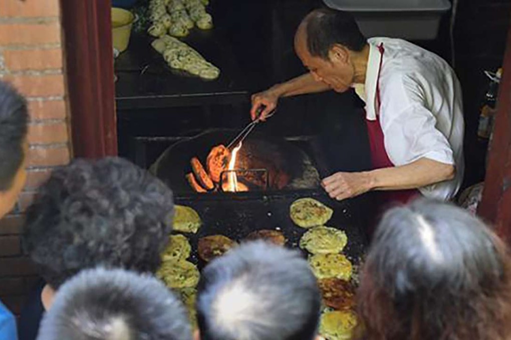 Shanghai baker Wu Gencheng was warned repeatedly by officials he needed to stop running his shop. Photo: SCMP Pictures