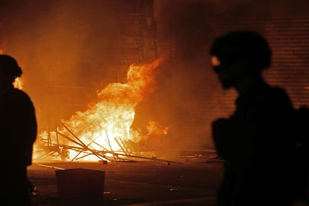 To some, the Mong Kok riot was an offshoot of the Occupy protests. Photo: AP