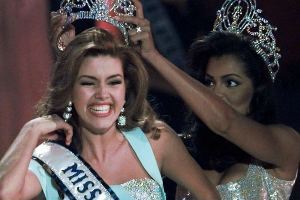 In this May 17, 1996, file photo, the new Miss Universe Alicia Machado of Venezuela reacts as she is crowned by the outgoing title holder Chelsi Smith in Las Vegas.Photo: AP