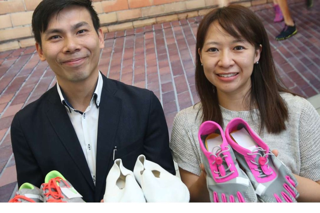 Roy Cheung and Wylie Tsang show off minimalist running shoes. Photo: David Wong