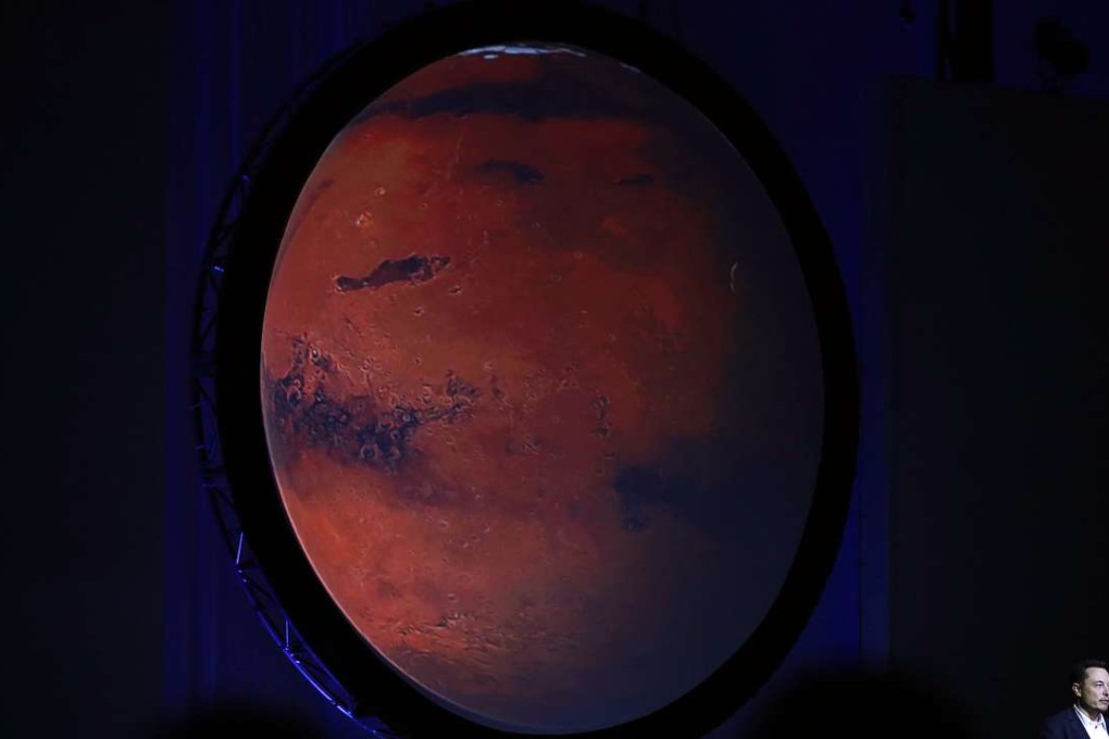 Elon Musk, chief executive officer for Space Exploration Technologies Corp. (SpaceX), speaks during the 67th International Astronautical Congress (IAC) in Guadalajara, Mexico. Musk delivered a keynote address at the conference titled "Making Humans a Multiplanetary Species" and tackled the technical challenges and "potential architectures for colonizing Mars, the Red Planet." Photo: Bloomberg