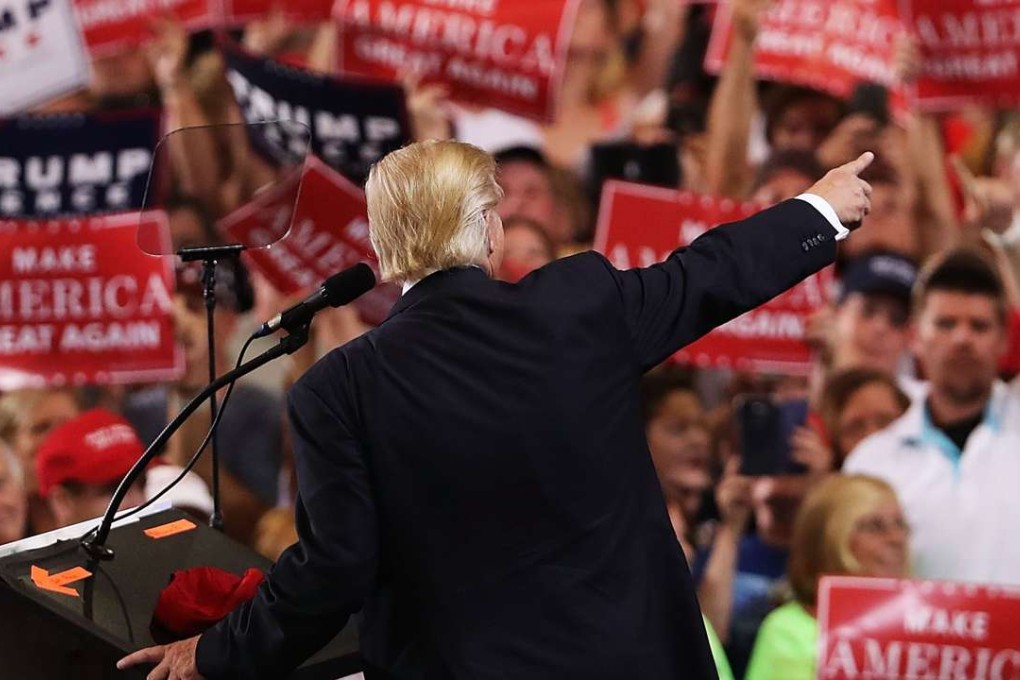 Donald Trump speaks to supporters at a Florida airport hanger, the day after his first debate with Hillary Clinton. Photo: AFP