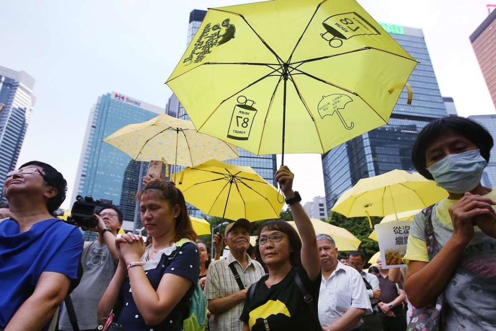People gather near the government offices in Admiralty to remember the Occupy Central movement. Photo: Sam Tsang
