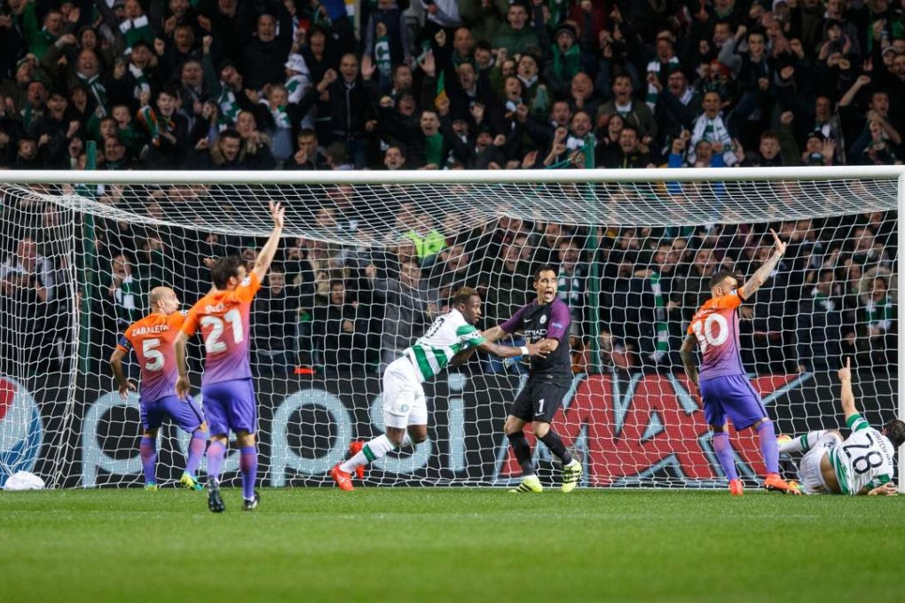 Celtic’s Moussa Dembele (C) scores the first goal during their incredible 3-3 draw in the Uefa Champions League group C match against Manchester City. Photo: EPA