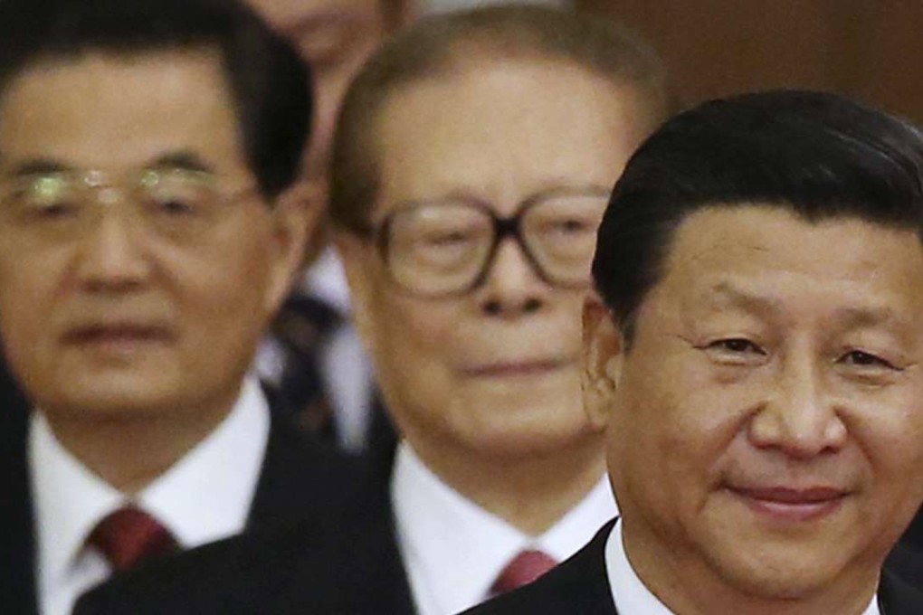 President Xi Jinping walks ahead of retired leaders Jiang Zemin (centre) and Hu Jintao as they arrive at the National Day reception at the Great Hall of the People in Beijing two years ago. Photo: Reuters