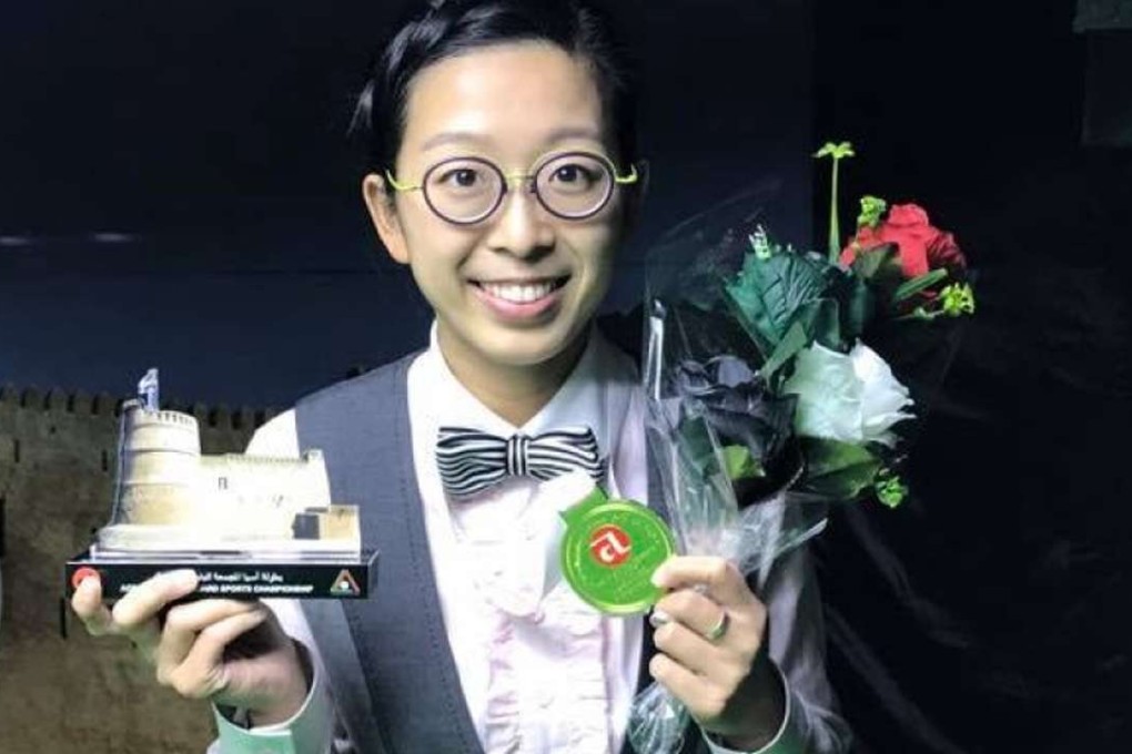 Ng On-yee with the Asian 6 Reds trophy