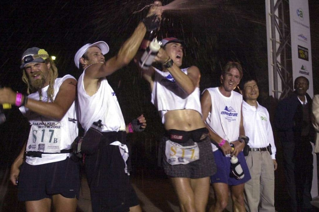 The Montrail Protreck team including Scott Jurek (third from left) celebrate their Trailwalker victory in 2002.