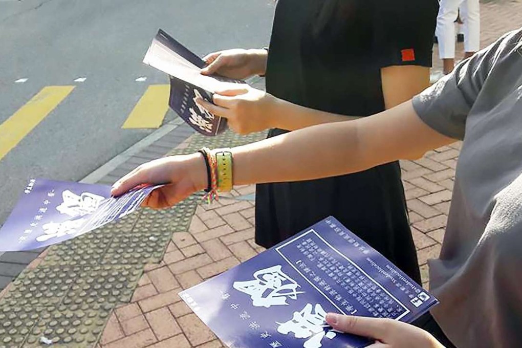 Members of a localist group giving out leaflets outside HKICC Lee Shau Kee School of Creativity. Photo: SCMP Pictures