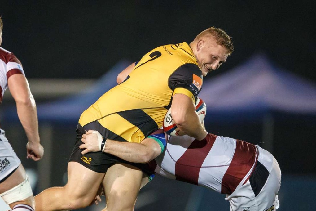 USRC Tigers recruit Ben Featherstone on the charge in his first match for the club against Kowloon. Photo: HKRU