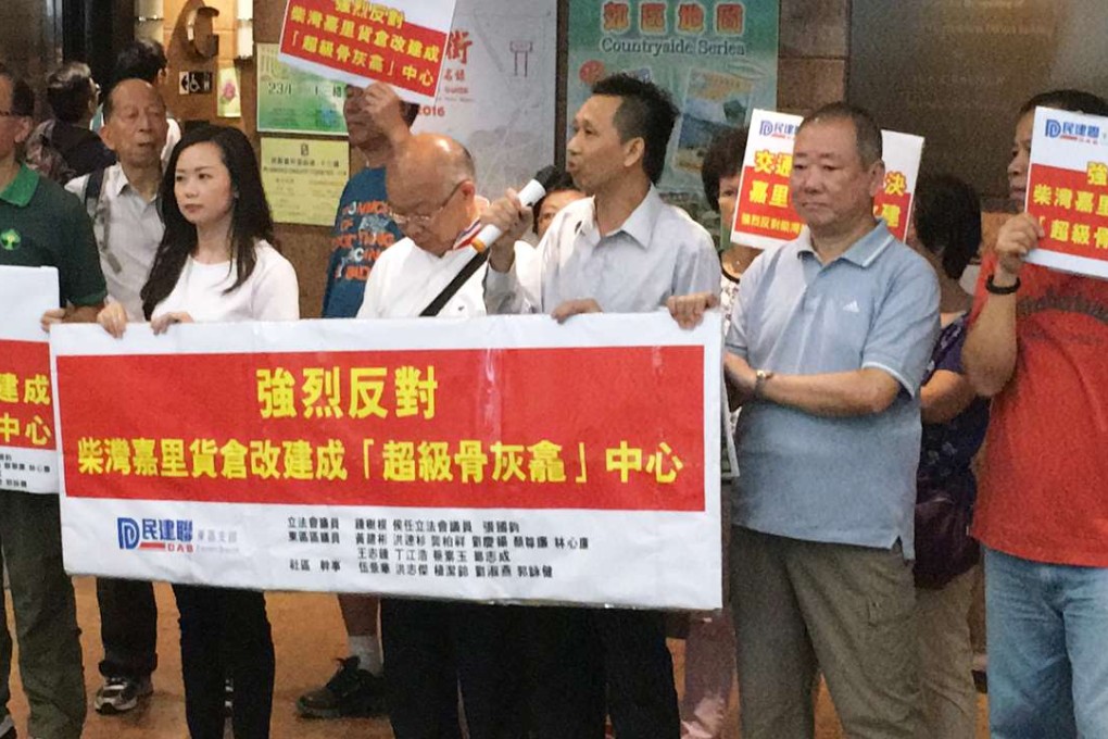 Protesters outside the office of the Town Planning Board at North Point voice their opposition to the columbarium proposal. Photo: SCMP Pictures
