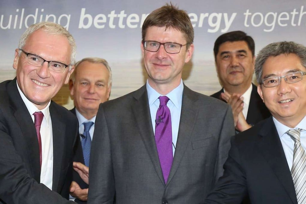 From left; EDF Group CEO Jean-Bernard Levy, France's Foreign Minister Jean-Marc Ayrault, Britain's Business Minister Greg Clark, China's Energy Minister Neur Bekri, and China General Nuclear Corporation (CGN) Chairman, He Yu. Photo: AFP