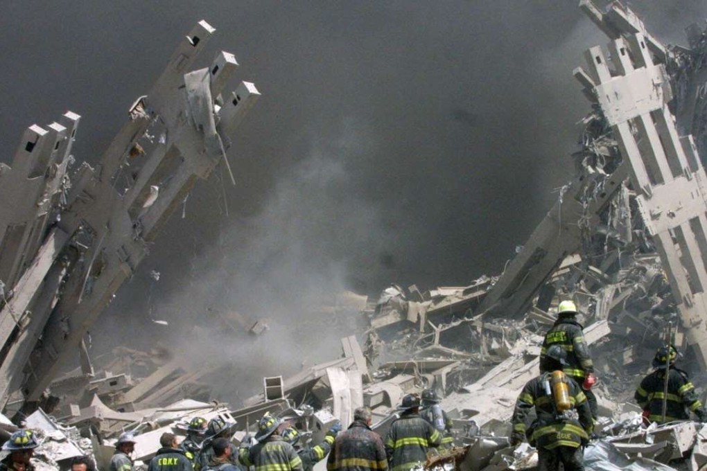 Firefighters make their way through the rubble after two airliners crashed into the World Trade Center in New York bringing down the landmark buildings in 2001. Photo: AP