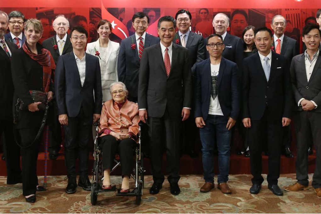 Awards ceremony attendees included (front row, from left) Mui Thomas’ parents Roy and Tina Thomas; Alan Lee Siu-lun; So Kam; Chief Executive Leung Chun-ying; Chu Kong Plan chairman Raymond Ho Chun-wai; Thomas Lau Kam-tai; Jacky Ko Chung-kit and Ike Park’s mother Choi Eun Young. (Back row, from left) Sino Group executive director Dr Daryl Ng Win-kong; Robin Hu; Sir David Akers-Jones; Sino Group general manager Nikki Ng Mien-hua; Armada Holdings Limited chairman Dr David Pang; Frederick Ma Si-hang; James Blake; SCMP Editor-in-Chief Tammy Tam; Ronald Arculli; and Hong Kong Council of Social Service CEO Chua Hoi-wai. Photo: Sam Tsang