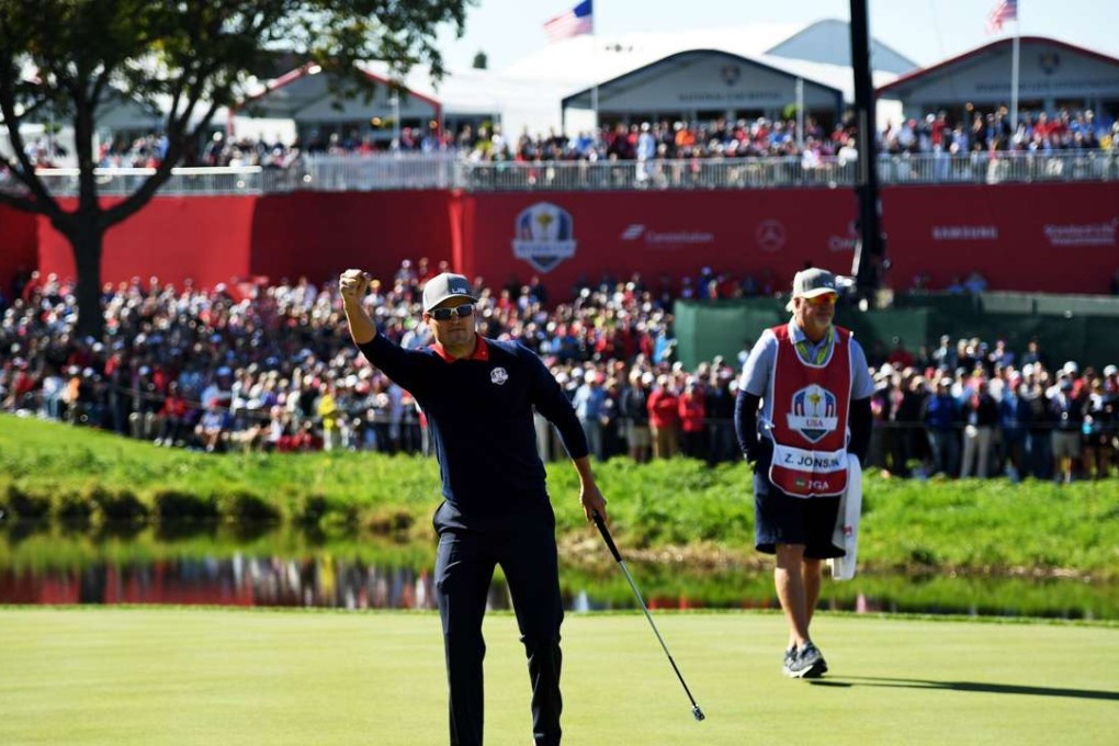 Zach Johnson of the United States reacts after making a putt on the 16th green to win the match during morning foursome matches of the 2016 Ryder Cup at Hazeltine National Golf Club. Photo: AFP