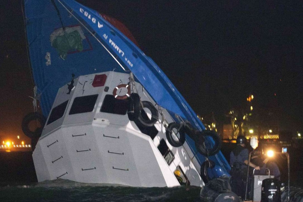 Rescuers approach the Lamma IV after the tragic collision on October 1, 2012. Photo: Reuters