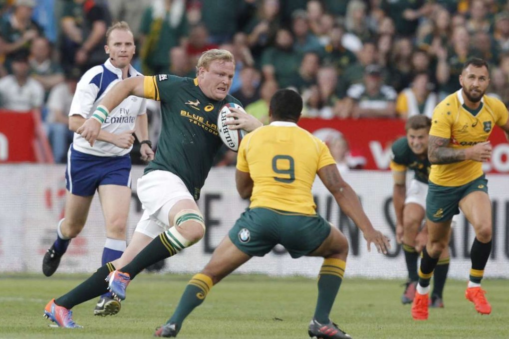 South Africa captain Adriaan Strauss runs with the ball. Photo: EPA