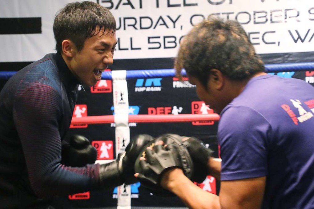 Hong Kong’s “Wonder Kid” works out with trainer Jake Verano at the DEF gym in Sheung Wan. Photos: Unus Alladin